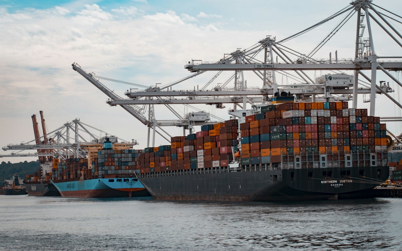 Cargo ships and container cranes at a port
